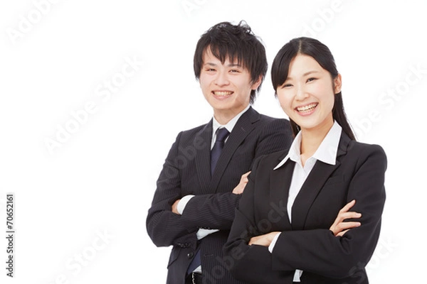 Fototapeta 腕を組んで笑うビジネスウーマンとビジネスマン