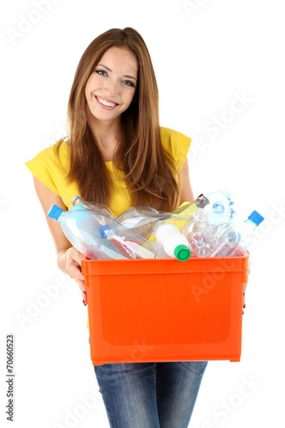 Fototapeta Young girl sorting plastic bottles isolated on white