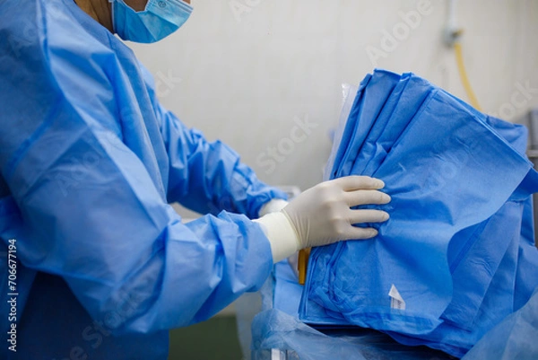 Fototapeta close-up of doctor and disposable clothes