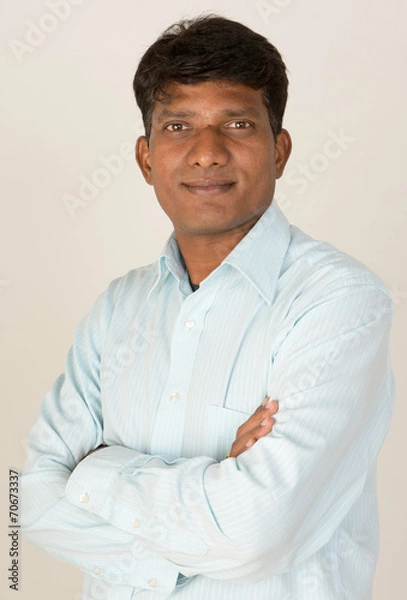 Obraz An Indian business executive with folded arms