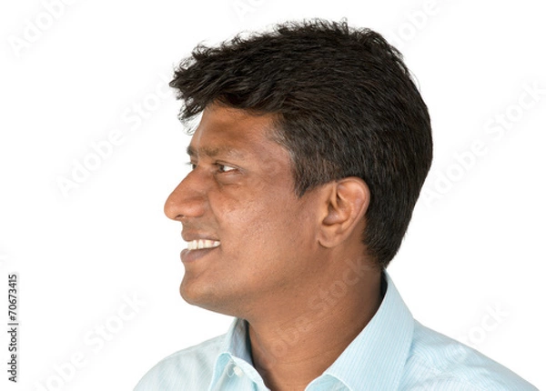 Obraz An Indian business executive side profile. Isolated.