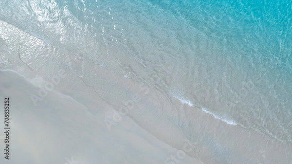 Fototapeta Beach Wave water in the Tropical summer beach with  sandy beach background