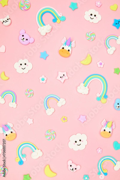 Fototapeta Trendy pastel pink kawaii background with cute air plasticine handmade cartoon animals, unicorns, stars, rainbows pattern. Top view, flat lay. Candycore, fairycore.