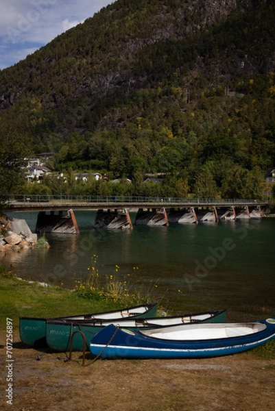 Obraz Travel and camping on campsite with a caravan in the nature