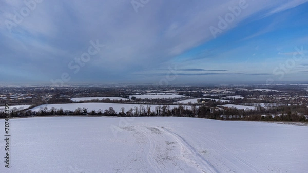 Obraz Snow-Covered Fields Near a Highway Captured from 100 Meters by Drone