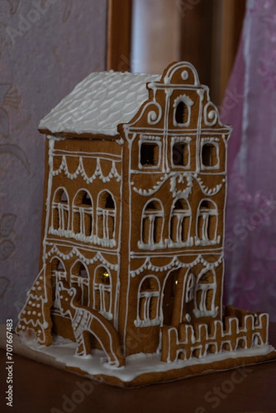 Obraz The hand-made eatable Christmas gingerbread house from ginger cookies.