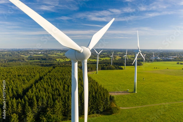 Fototapeta A clean energy future is possible with wind power