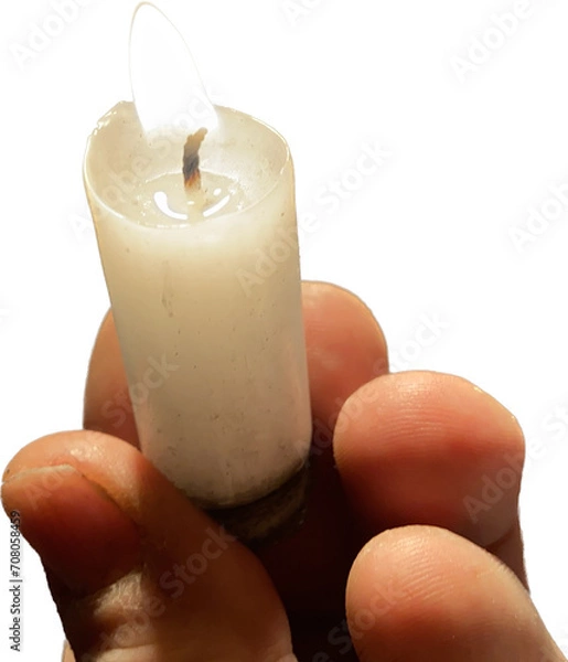 Obraz Small wax candle lit. Natural light from flame. Religious object from the Catholic church. Image with neutral and light background.