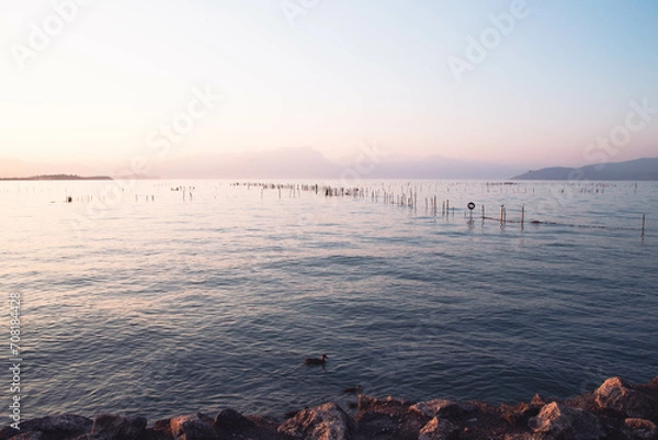 Obraz a place for placing fishing nets on Lake Garda,