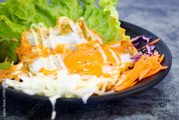 Obraz Fried egg salad in Thai style