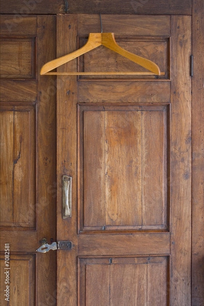 Obraz Wooden Hanger On Antique Closet
