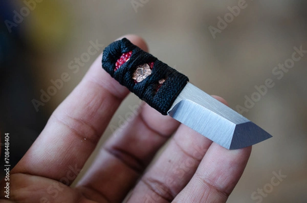 Fototapeta Red and black colure with tanto knife handle wraping