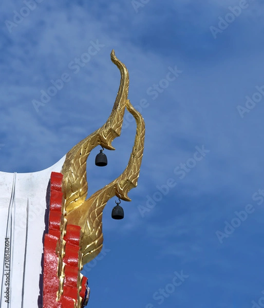 Obraz gable apex of the church in a Buddhist temple On a clear sky day