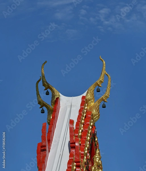 Obraz gable apex of the church in a Buddhist temple On a clear sky day