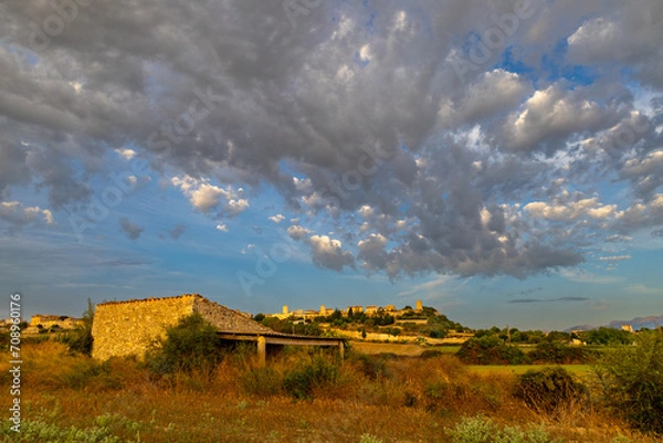 Obraz Sunrise at Muro, Mallorca with dramatic clouds