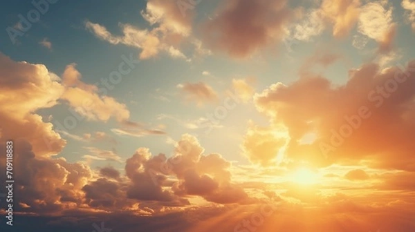 Fototapeta Cloud Play Photograph the clouds in the sky as they catch the last rays of the setting sun. Emphasize the dynamic and dramatic cloud formations, adding depth and texture to the sunset scene