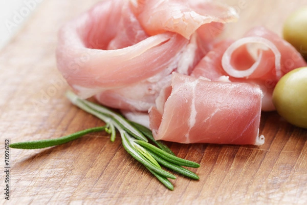Fototapeta dried jamon slices on wood table