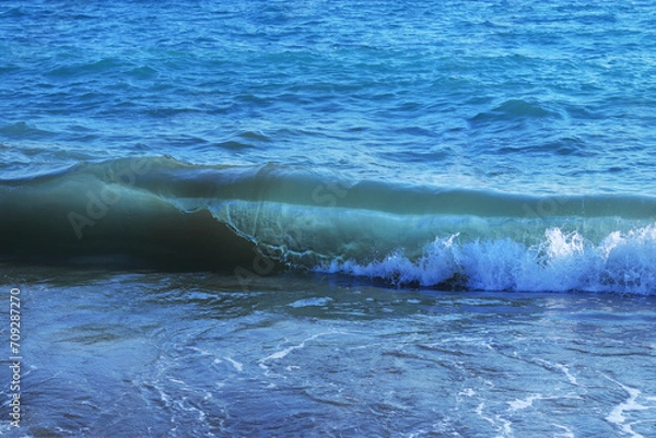 Fototapeta Beautiful Seascape. Turbulent the sea. Vacation and summer concept. Landscape. Powerful Ocean blue waves with white foam. Sea waves. Blue sea water background. Blue ocean background. Bubbling Sea wave
