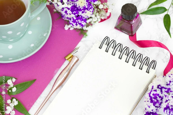 Fototapeta Flowers and notebook