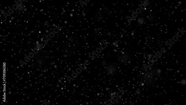 Fototapeta Falling white snow. Snowflakes on overlay black background