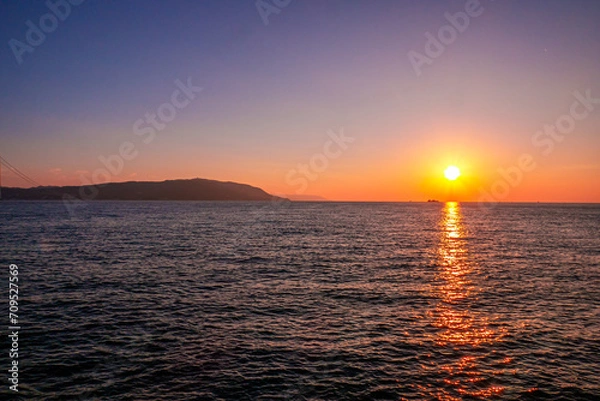 Obraz 海に沈む夕日