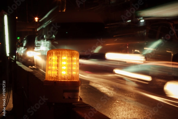 Fototapeta LED Warning Light side of the road is under construction and Bok