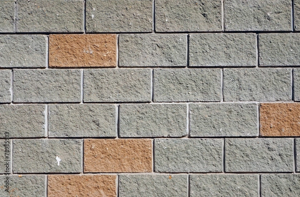 Fototapeta The wall of the large gray and red rectangular stones as backgro
