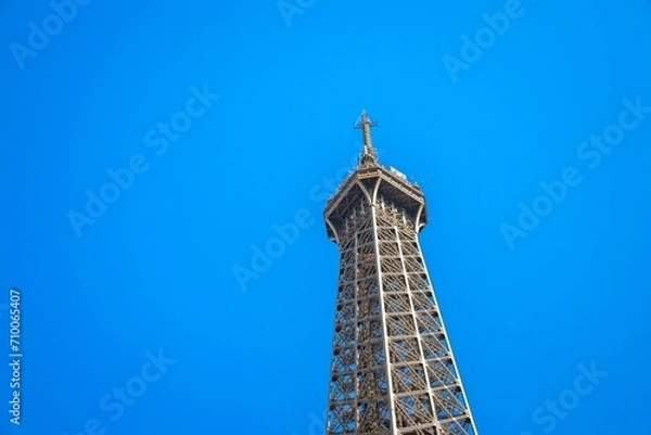Fototapeta Top and third level of the Eiffel Tower in Paris, France on a summer day