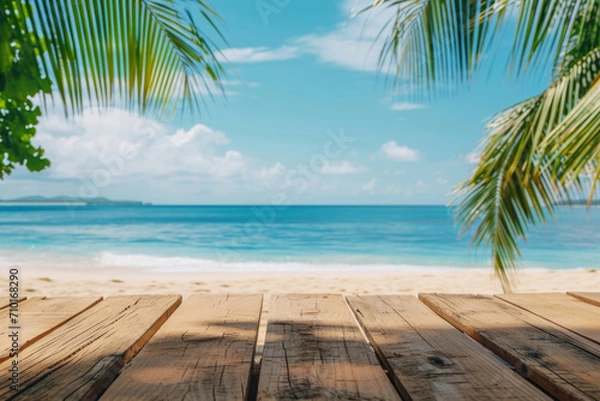 Fototapeta Empty wooden table with tropical beach theme in background. Generative AI