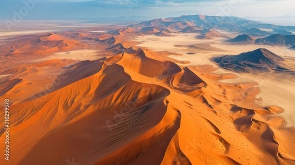 Fototapeta Aerial view of red sand in the desert.