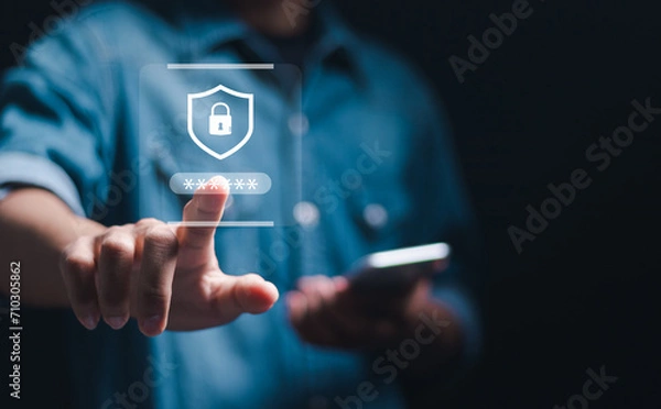 Fototapeta Cyber security network and access data concept. Businessman using mobile smartphone with virtual cyber security icon for access security personal data.