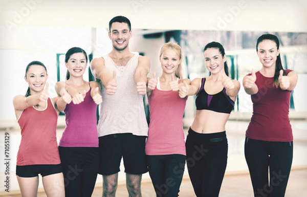 Fototapeta group of people in the gym showing thumbs up