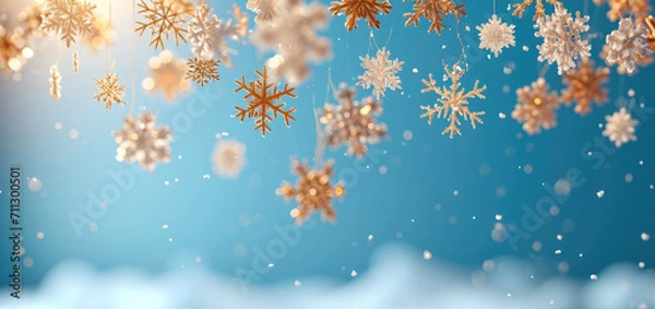 Fototapeta Golden snowflakes of the correct shape fall from the sky on a light blue background. Generative AI.