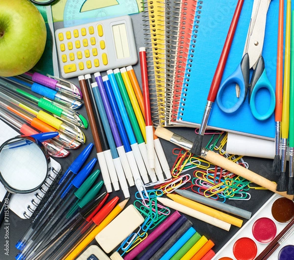 Fototapeta Desk covered with multiple stationery