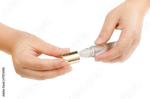 Fototapeta Hand with mini rollon