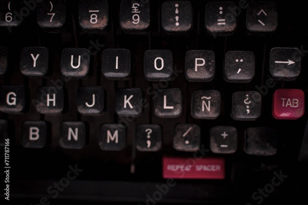 Fototapeta Keys of a typewriter on dark background.