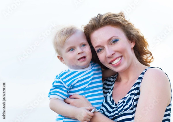 Fototapeta Happy family having fun at the beach