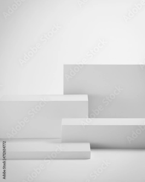 Fototapeta Gorgeous white cubes on flat surface with cast shadow, podium for products presentation, mockup. Stage for showcase. 