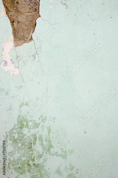 Fototapeta crack in plaster on wall, bricks and mortar behind as structure