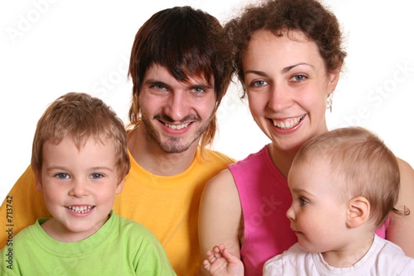 Fototapeta family of four in color t-shirts