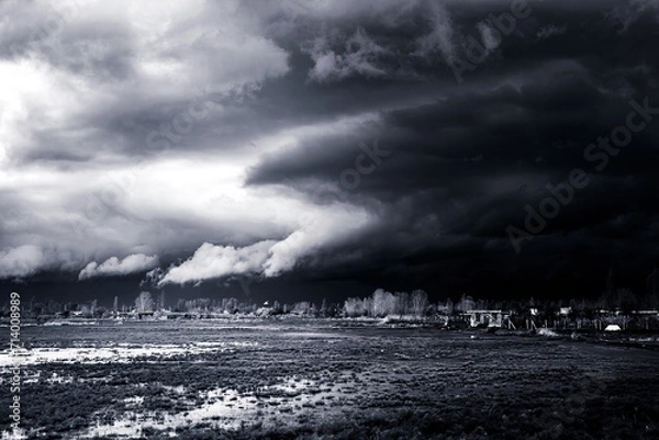 Obraz storm clouds over the forest