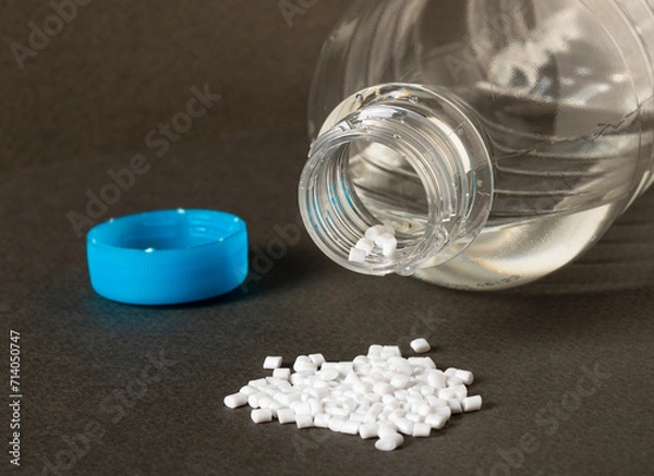 Obraz Plastic water bottle and plastic pellets