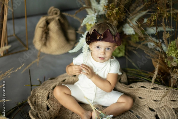 Obraz small child in a costume and fairy-tale decorations