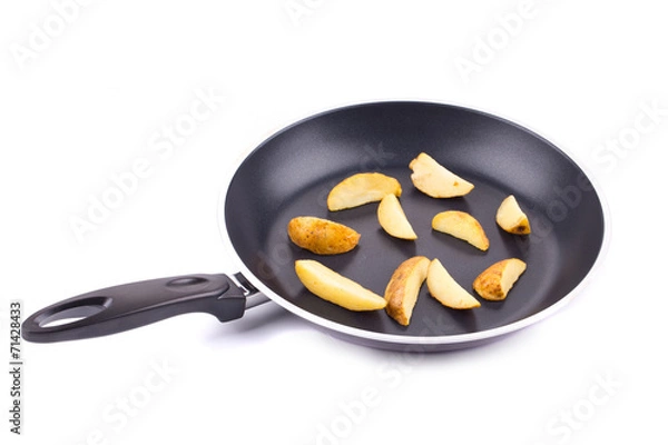 Obraz Frying pan with potatoes closeup