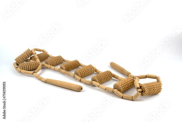 Obraz Wooden back massager with handles isolated on a white background.
