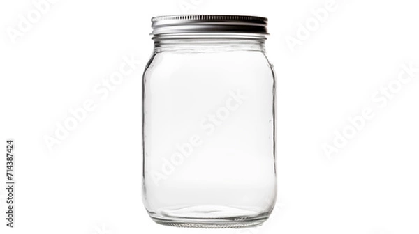 Fototapeta A transparent glass jar with a metallic lid, suitable for storing various items.