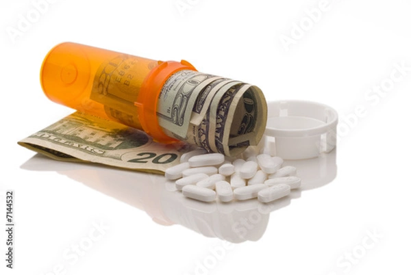 Obraz Spilled expensive pills from medication bottle