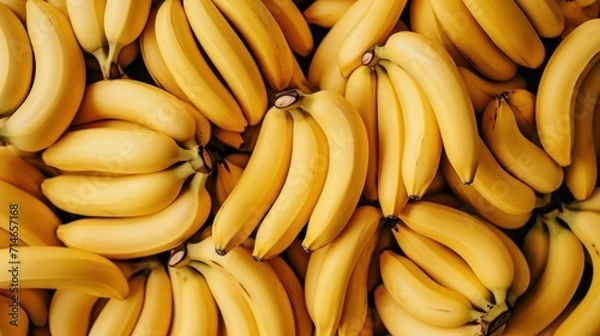 Fototapeta  a large pile of ripe bananas sitting on top of a pile of unripe bananas on top of a pile of unripe bananas on top of other ripe bananas.