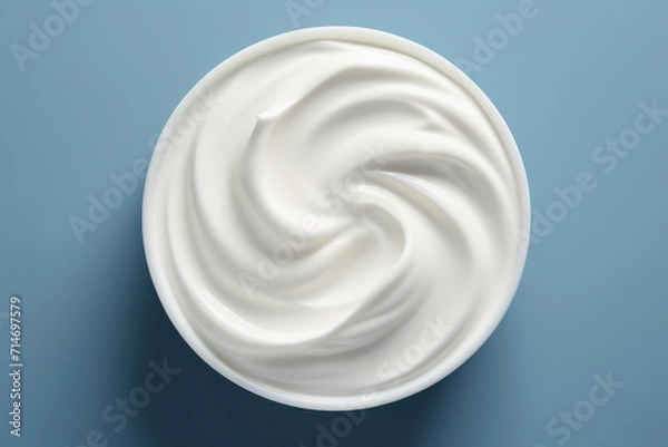 Obraz Delicious Dairy Cream on Natural White Background: Top View of Healthy Skin Product in a Jar