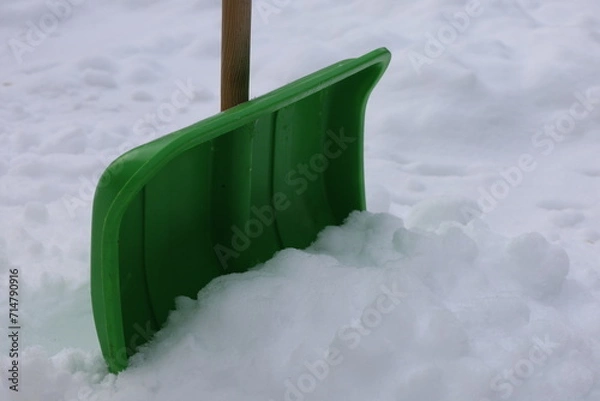 Obraz green snow shovel in the snow